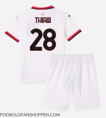 AC Milan Malick Thiaw #28 Udebanetrøje Børn 2024-25 Kortærmet (+ Korte bukser)